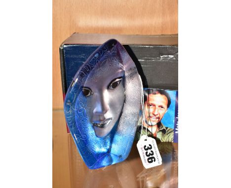 A BOXED MATS JONASSON GLASS SCULPTURE, for Maleras Sweden, Masq sculpture titled 'Blue Fleur', depicting a female face with f