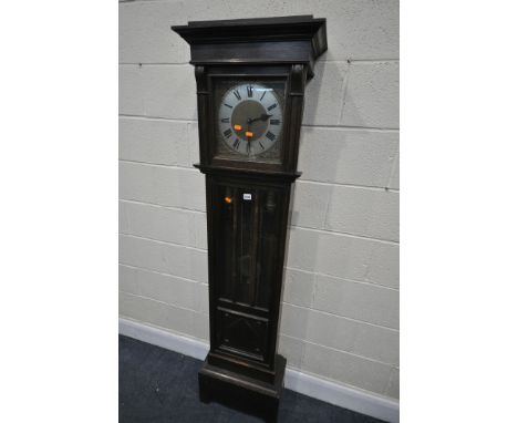 AN EARLY TO MID 20TH CENTURY OAK CHIMING LONGCASE CLOCK, with a brass and silvered dial, and roman numerals, height 181cm, wi