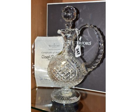 A BOXED WATERFORD CRYSTAL CLARET DECANTER, from The Master Cutter Collection, of footed ovoid form with narrowing handle and 