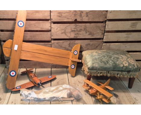 A Selection of wooden items; Wooden plane models, Diablo juggling game and stool.