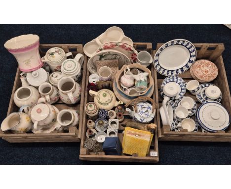 Three Crates of collectables; Portmeirion Botanic pattern tea wares, Laura Ashley cockerel design plates and tea pots. Set of
