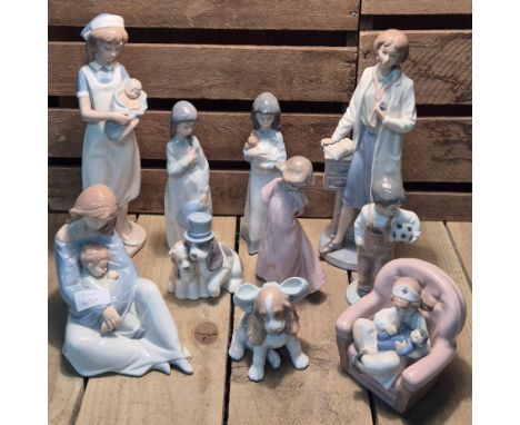 Crate of Nao Figurines; Nurse with baby, girl with hat, Girl with puppy, girl in pink dress, Doctor, Mother and child, puppie