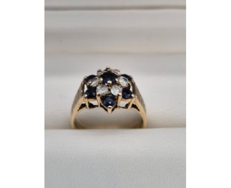 9ct yellow gold Sapphire and CZ Stone cluster ring. 3.48Grams. Ring size M. 