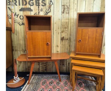 A selection of mid century teak furniture; Pair of Teak bedside cabinets, Nest of teak tables, Coffee table &amp; teak standa