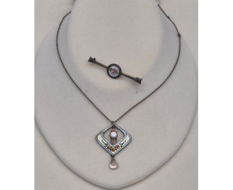 Two items of Charles Horner jewellery; Chester silver and enamel brooch. Together with a silver and enamel pendant. Comes wit