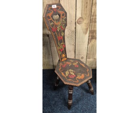 Arts and crafts poker work Spinning wheel chair, Raised on turned supports. Hand painted berry design. 89cm tall.