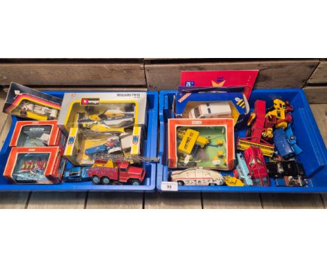 A collection of boxed and loose Model vehicles; Britains Ford 5000 tractor, Cultivator, Crop Spray and Hay Baler- all boxed. 