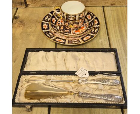 Royal crown derby Imari Trio together with silver plated shoe horn &amp; button hooks in fitted case 