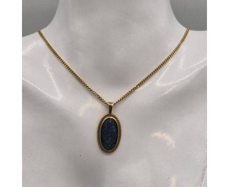 9ct yellow gold and opal pendant. Together with a 9ct yellow gold curb necklace. 38cm length chain. 6.43Grams. 