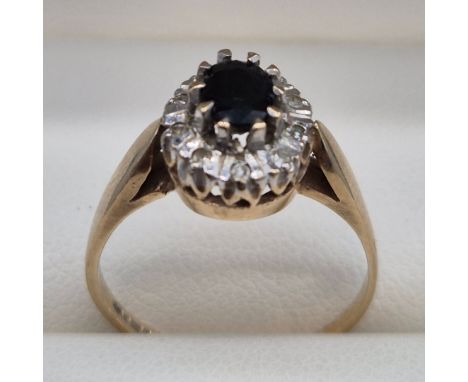 9ct yellow gold Sapphire and diamond stone ring. 2.58grams. Ring size N. 