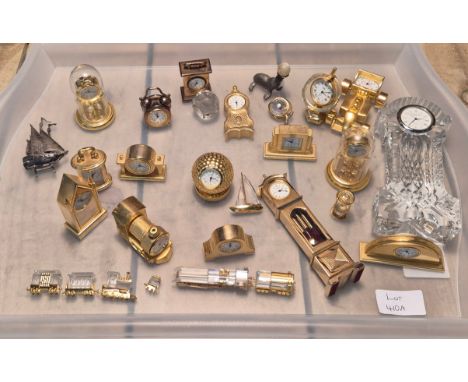 A Tray of collectable clocks and crystal; Swarovski crystal trains and carriages. Waterford crystal clock. 925 silver boat mo