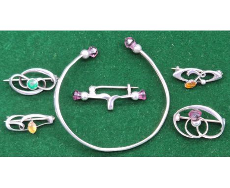 A Collection of Charles Horner Chester silver brooches and bangle.