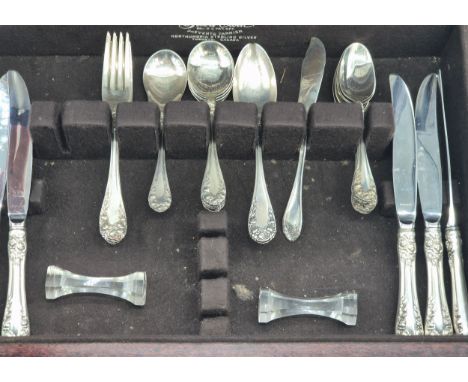Mahogany canteen chest containing a selection of Northumbria Sterling silver Normandy rose design cutlery. Silver handle kniv