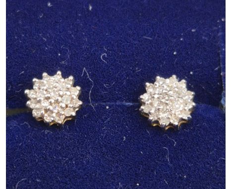 Pair of 9ct yellow gold and diamond cluster earrings. 