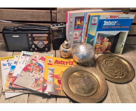 Crate of collectables; Eton S350DL World receiver. Multi band radio, Brass wares and a collection of Asterix comics and annua