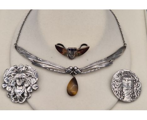 A Selection of Art Nouveau inspired jewellery; Dragonfly design necklace fitted with a single tiger eye stone. Art nouveau fa
