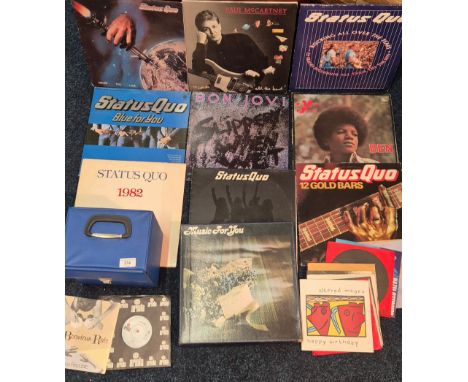 A Collection of LP and 45 R.P.M's;Status Quo, Bon Jovi, Paul McCartney, Michael Jackson LP's and Status Quo, Rod Stewart, Bon