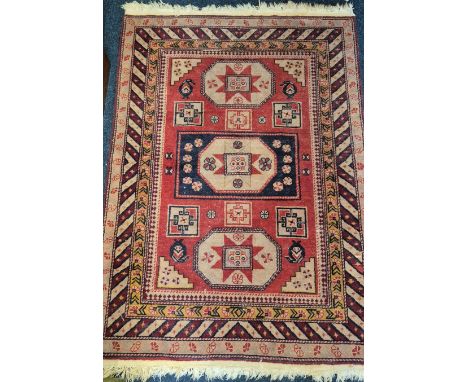 Afghan Hand knotted Kazak red ground rug. 164x115cm. 