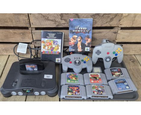 Nintendo 64 console with two controllers &amp; selection of games- Turok, WWE No Mercy, super Mario Kart 64,Pokeman Snap, F-z