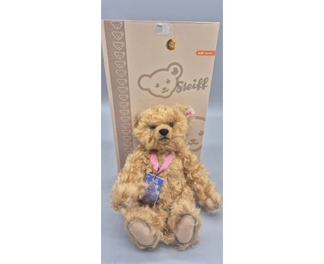 A Collectable Steiff Musical bear " The Sound of Music bear" with moveable limbs &amp; Steiff display box