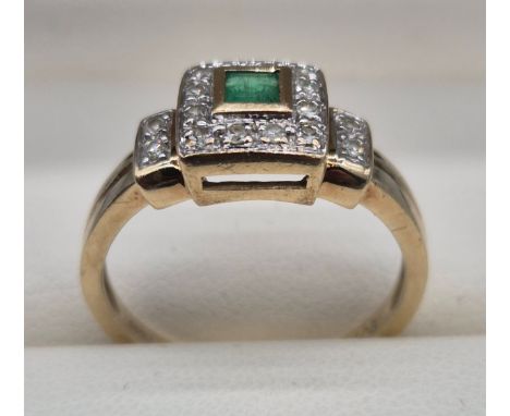 9ct yellow gold, emerald and diamond stone ring. 3.33grams. Ring size R.