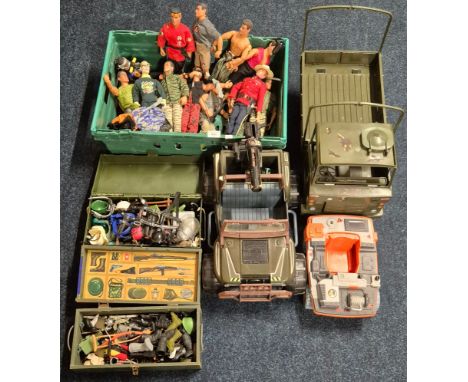 A Large collection action man dolls, two small crates of clothing &amp; Accessories. Together with three action man Hasbro ve