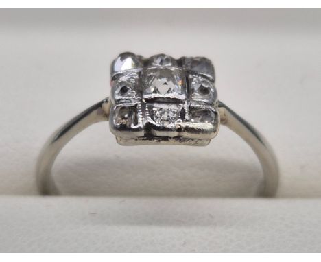 Art Deco 18ct white gold and platinum diamond stone ring. 0.15cts. Ring size O. 2.08Grams. 
