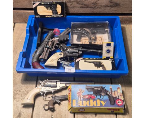 A Selection of vintage toy guns; German Wicke Buddy cap gun with box. 1960's redbox toys 707 Cigarette packet hidden gun toy.