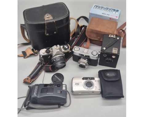 A Collection of Vintage Cameras; Pentax ME super, Zeiss Ikon Contina model camera Six-20 Brownie junior boxed camera &amp; ot