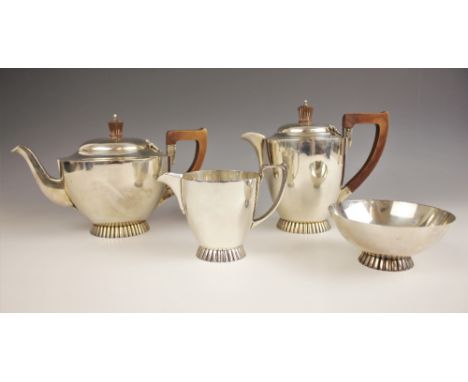 A George VI silver tea service, Wakely &amp; Wheeler, London 1941, comprising a teapot, hot water jug, milk jug and sugar bow