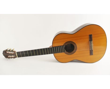 A David Rubio classical concert guitar, made by Edward. B. Jones, paper label to the interior 'Rubio Workshop, Made by Edward