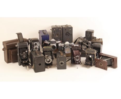 An extensive collection of vintage cameras and photographic equipment, to include a Praktica L SLR camera with Carl Zeiss Jen