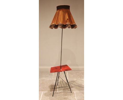 A mid 20th century standard lamp, with a chromed pole upon a simulated marble table top and three out swept iron supports, la