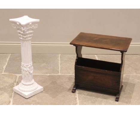A contemporary oak magazine rack/occasional table, in the 17th century style, late 20th century, the rectangular top above a 
