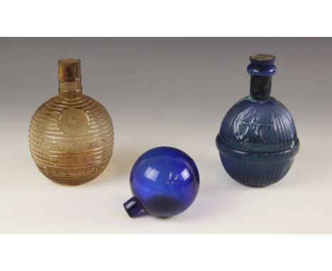 A Hardens fire grenade, the cobalt blue glass bottle of ribbed bulbous form, sealed with original contents, 17cm high, along 