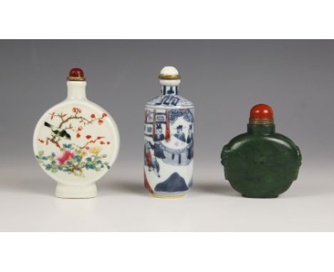 Three Chinese snuff bottles and stoppers, comprising; a nephrite jade oval bottle, carved with zoomorphic ring lugs, carnelia