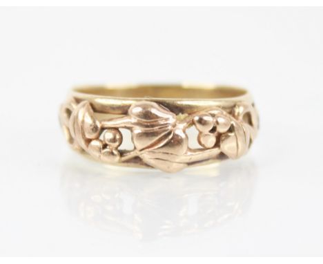 A Clogau 9ct gold 'Tree of Life' ring, the pierced rose gold front section modelled as scrolling foliage, upon a tapered plai