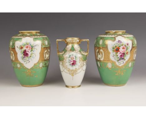 A Noritake vase, of two handled form, decorated with flowers against a green, white and gilt ground, green printed mark, 15cm