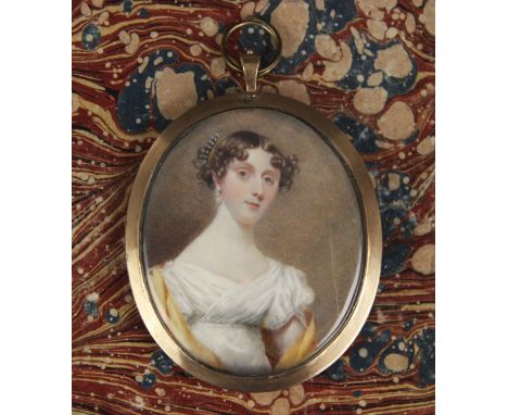 English school (late 18th/early 19th century),A half length portrait miniature depicting a young lady in white empire line dr