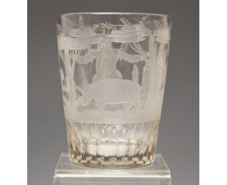 A clear glass tumbler, probably German, 19th century, the straight sided tumbler engraved with a continuous view of a hunting