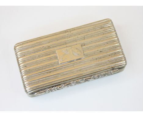 An early Victorian silver snuff box, the rectangular body with hinged cover and engraved anchor and fish decoration, the gilt