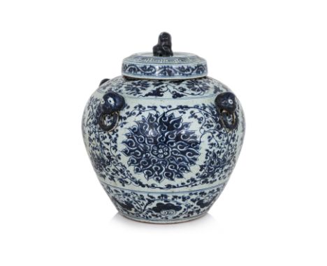 A LARGE BLUE AND WHITE JAR AND COVER
20th Century, decorated in flowing lotus vines, four figural lugs to shoulders, circular