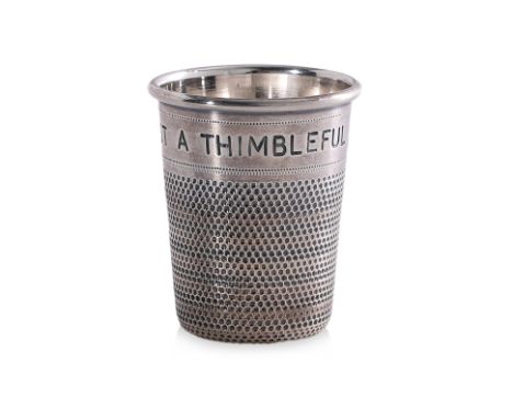 AN ENGLISH NOVELTY SILVER 'JUST A THIMBLEFUL' SPIRIT MEASURE
P.H.Vogel & Co, Birmingham 1962, modelled in the form of an over