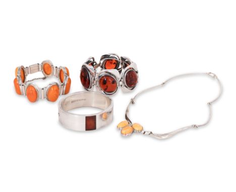 A GROUP OF POLISH MODERNIST AMBER AND SILVER JEWELLERY
Comprising of a hinged bangle by Marcin Zarenski, a foliate bracelet s