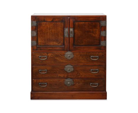 A KOREAN ELM CABINET
1st half 20th Century, fitted with a pair of cupboard doors above three long drawers, with well figures 
