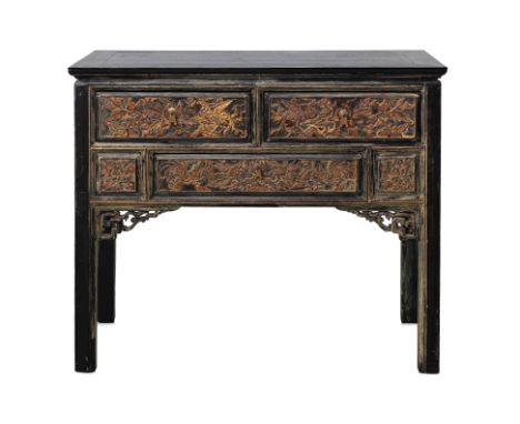 A CARVED AND PARCEL GILT DRAGON AND PHOENIX SIDE CABINET
Fitted with an arrangement of drawers, decorated in relief with drag