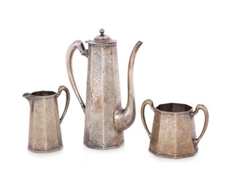 AN AMERICAN SILVER THREE PIECE COFFEE SERVICE
By Woodside New York, circa 1900, octagonal teapot with hinged cover (handle de