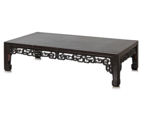 A CHNESE CARVED RECTANGULAR KANG TABLE
Lacquered elm, with carved openwork scroll aprons
24 x 91 x 49cm
Condition Information