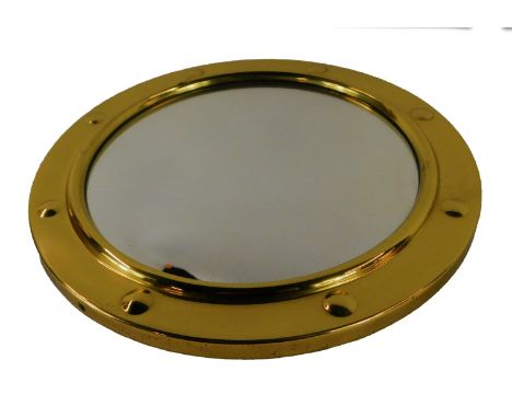 A 20thC brass framed porthole mirror, 26cm diameter.