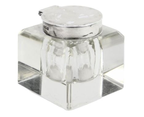 A George VI silver and cut glass inkwell, with a circular hinged lid, Birmingham 1945, 6cm high.